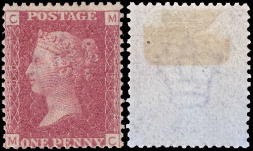 Penny Red stamp from 1864 with remain on hinges on the reverse side