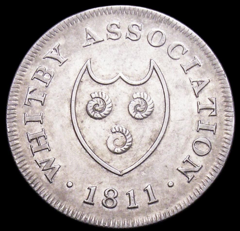 Snakestone of Whitby Association on English token from 1667
