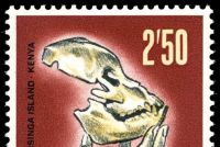 Skull of prehistoric primate Proconsul in stamp of Kenya Tanzania Uganda 1967