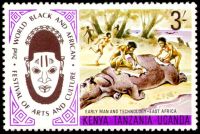 Stone age primitive mans butchering a Hippopotamus on stamps of Kenya 1975