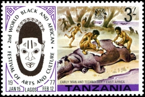 Hippopotamus and prehistoric humans on stamp of Tanzania 1977