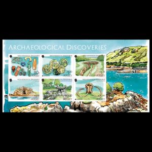 Mammoth skull in between other archeological discoveriess on EUROPA stamps of Jersey 2025
