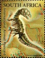 Fossil of Heterodontosaurus dinosaur on 3D stamp of South Africa 2009