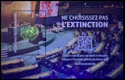 Don’t Choose Extinction stamp of UN Postal Administration Geneva  2023, under UV light