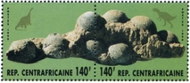 Dinosaur eggs on stamp