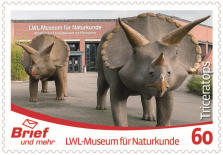 Sculptures of Triceratops in the front of Natural History Museum in Muenster on stamp of "Brief und mehr" post company of Germany 2017