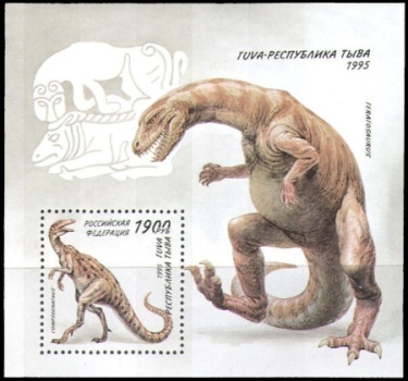 Dinosaurs on stamps-like labels of Tuva region of Russia