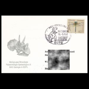 Fossil skull of Triceratops on cachet and reconstruction of Tyrannosaurus rex on postmark of commemorative cover of stamp show in Neu-Isenburg