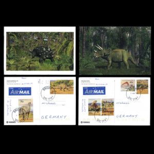 Dinosaurs and Pterosaur stamps of Australia 1993 on circulated postcards